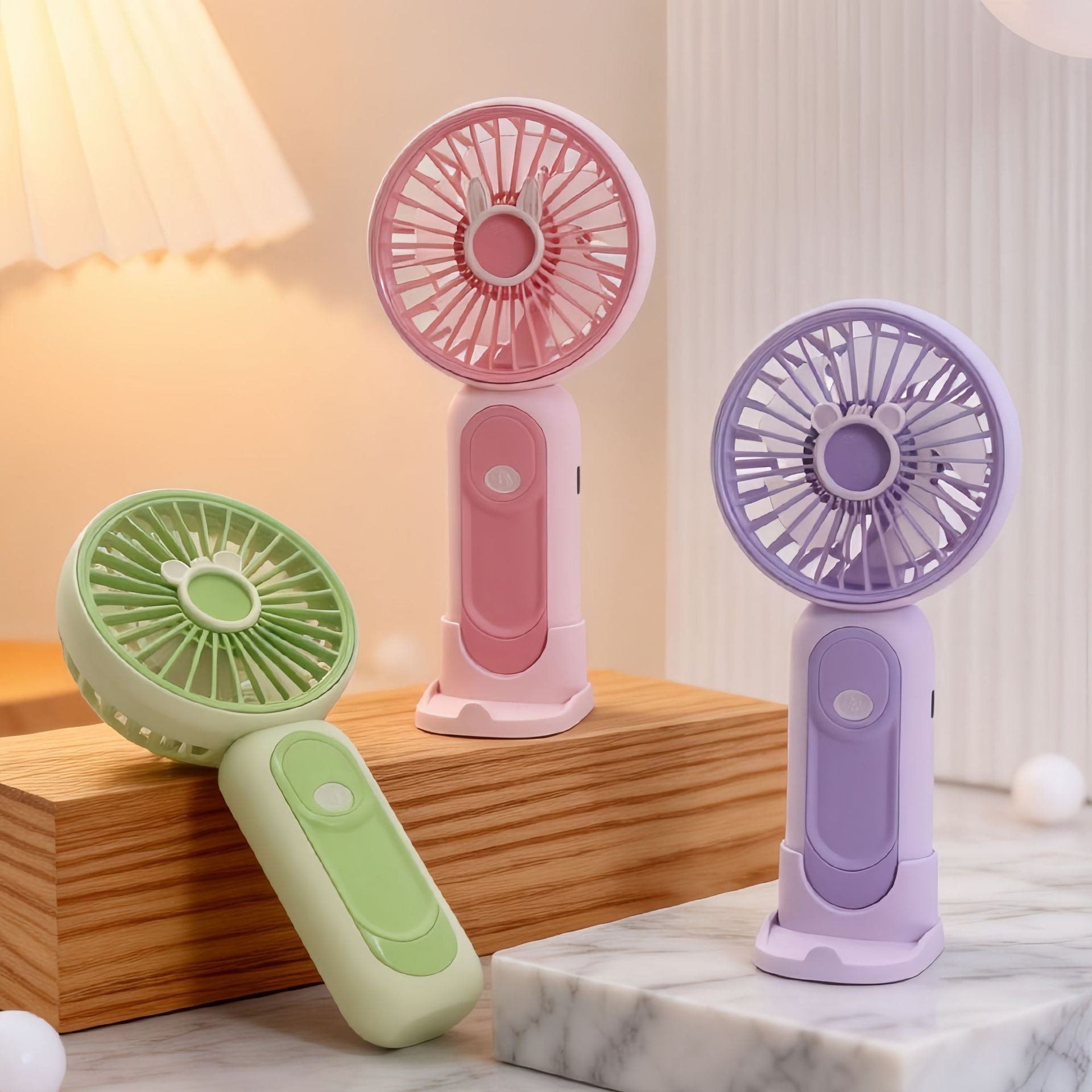 Portable Handheld Fan in ABS Plastic with Removable Stand and Rechargeable Battery 1